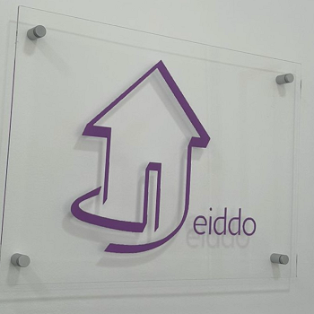 logo eiddo on the office wall
